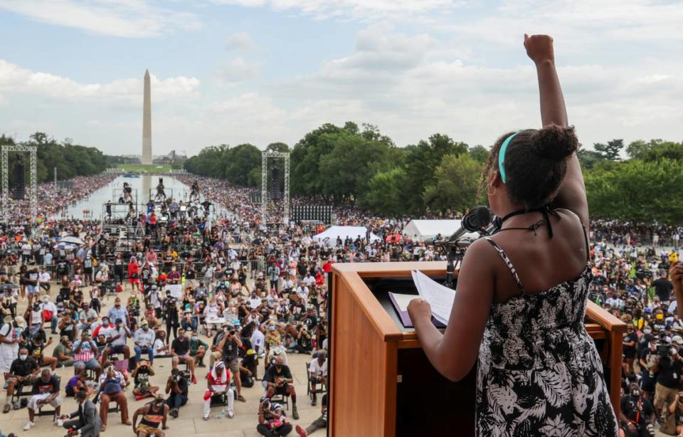 FILE - Yolanda Renee King, granddaughter of The Rev. Martin Luther King Jr., raises her fist as she speaks during the March on Washington, on the 57th anniversary of the Rev. Martin Luther King Jr.’s “I Have a Dream” speech on Aug. 28, 2020. California’s first-in-the-nation task force on reparations is at a crossroads with members divided on which Black Americans should be eligible for compensation. The task force could vote on the question of eligibility on Tuesday, March 28, 2022, after putting it off at last month’s meeting. (Jonathan Ernst/Pool Photo via AP, File)