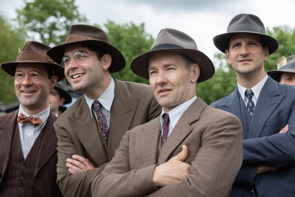 (l-r.) Chris Diamantopoulos stars as Royal Brougham, James Wolk as Coach Bolles, and Joel Edgerton as Al Ulbrickson in director George Clooney’s THE BOYS IN THE BOAT An Amazon MGM Studios film. (Laurie Sparham)