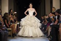 Model Coco Rocha walks the runway as the Zac Posen Spring 2013 collection is modeled during Fashion Week in New York, Sunday, Sept. 9, 2012. (AP Photo/John Minchillo)