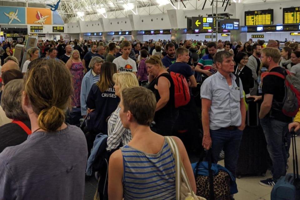 Big squeeze: the check-in area at Gran Canaria airport: James Lear