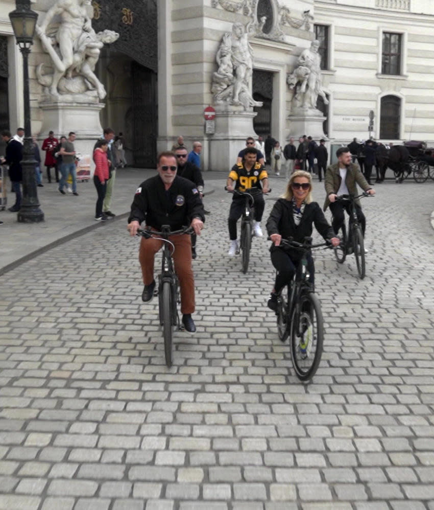 Actor and activist Arnold Schwarzenegger, with correspondent Tracy Smith, riding on cobblestones in Vienna.  / Credit: CBS News