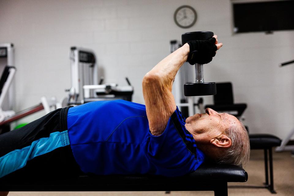 Les Savino, 99, lifts weights in the Men's Wellness Center at the Hanover YMCA, Friday, Aug. 26, 2022, in Hanover Borough. Savino does 900 reps total on Mondays, Wednesdays, and Fridays, when he lifts weights. On Tuesdays and Thursdays, Savino bikes eight miles on a machine and walks two miles on a treadmill.