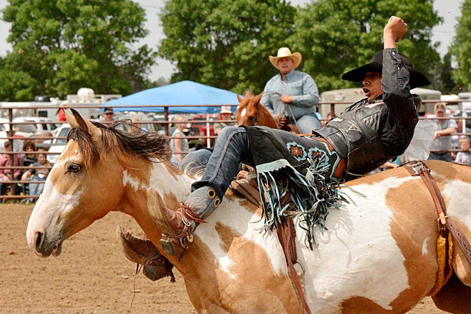 Devon Moore of Clear Lake rides in the bareback event during the Watertown East Region High School Rodeo at Derby Downs on Saturday, June 10, 2023.