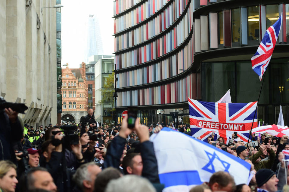 Crowds wait for the arrival of Tommy Robinson at the Old Bailey (Picture: PA)