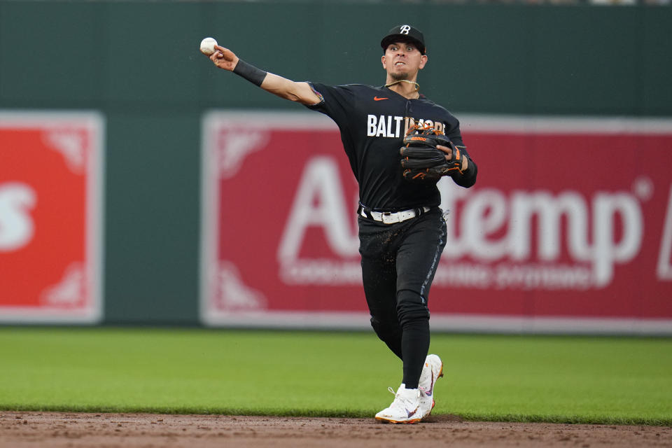 Baltimore Orioles second baseman Ramon Urias fields a groundout by the Kansas City Royals during the third inning of a baseball game, Monday, Jan. 4, 2021, in Baltimore. (AP Photo/Julio Cortez)