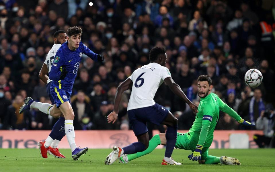 Kai Havertz of Chelsea scores their team's first goal past Hugo Lloris of Tottenham Hotspur during the Carabao Cup Semi Final First Leg match between Chelsea and Tottenham Hotspur at Stamford Bridge on January 05, 2022 in London, England.  - GETTY IMAGES