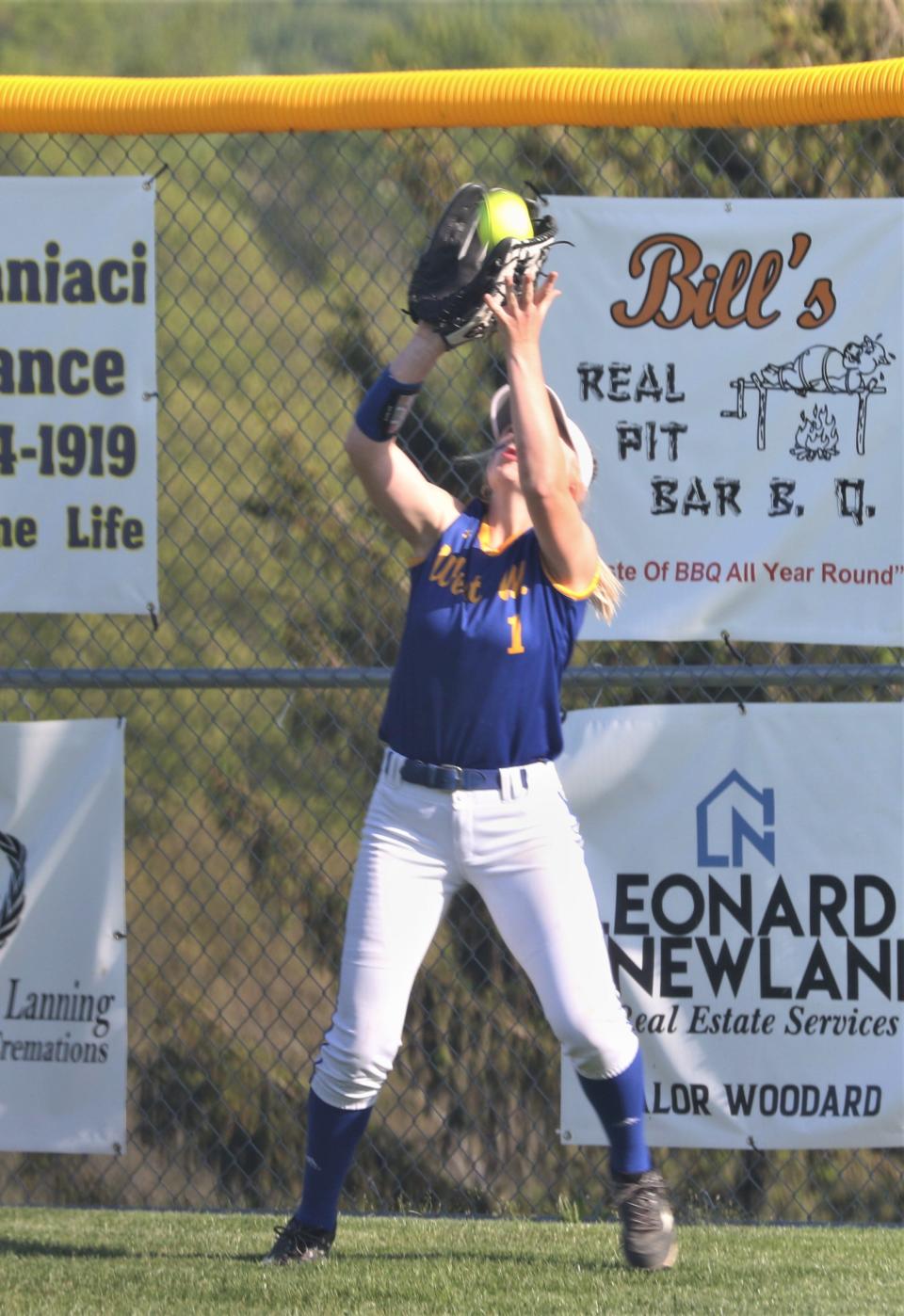 West Muskingum right fielder Peyton Brown catches a fly ball against West Holmes in Wednesday's 8-6 sectional final victory.