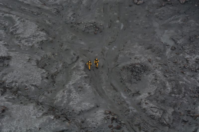 Rescue crew are seen at the White Island volcano in New Zealand