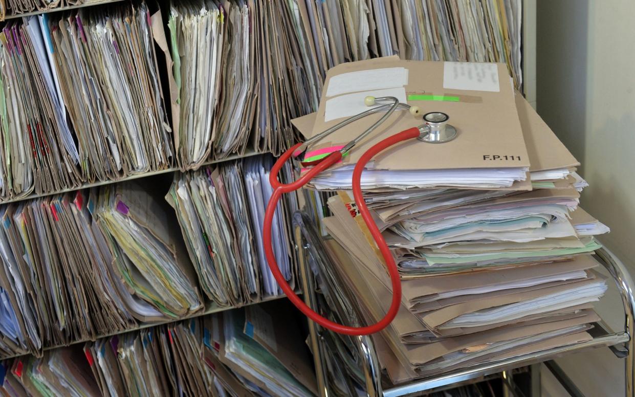 a stethoscope on top of a pile of patients' files - Anthony Devlin/PA