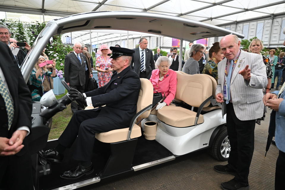 Britain’s Queen Elizabeth II sits in a buggy during a visit by members of the royal family to the RHS Chelsea Flower Show 2022. - Credit: AP