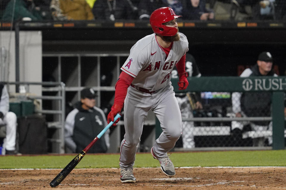 Los Angeles Angels' Jared Walsh watches his one-run double during the eighth inning of a baseball game against the Chicago White Sox in Chicago, Friday, April 29, 2022. (AP Photo/Nam Y. Huh)