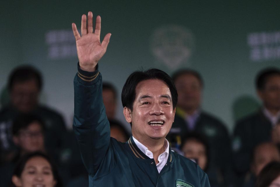 Taiwanese Vice President Lai Ching-te, also known as William Lai, left, celebrates his victory in Taipei, Taiwan, Saturday, Jan. 13, 2024. The Ruling-party candidate emerged victorious in Taiwan's presidential election on Saturday and his opponents conceded, a result that will chart the trajectory of the self-ruled democracy's relations with China over the next four years. (AP Photo/Louise Delmotte)