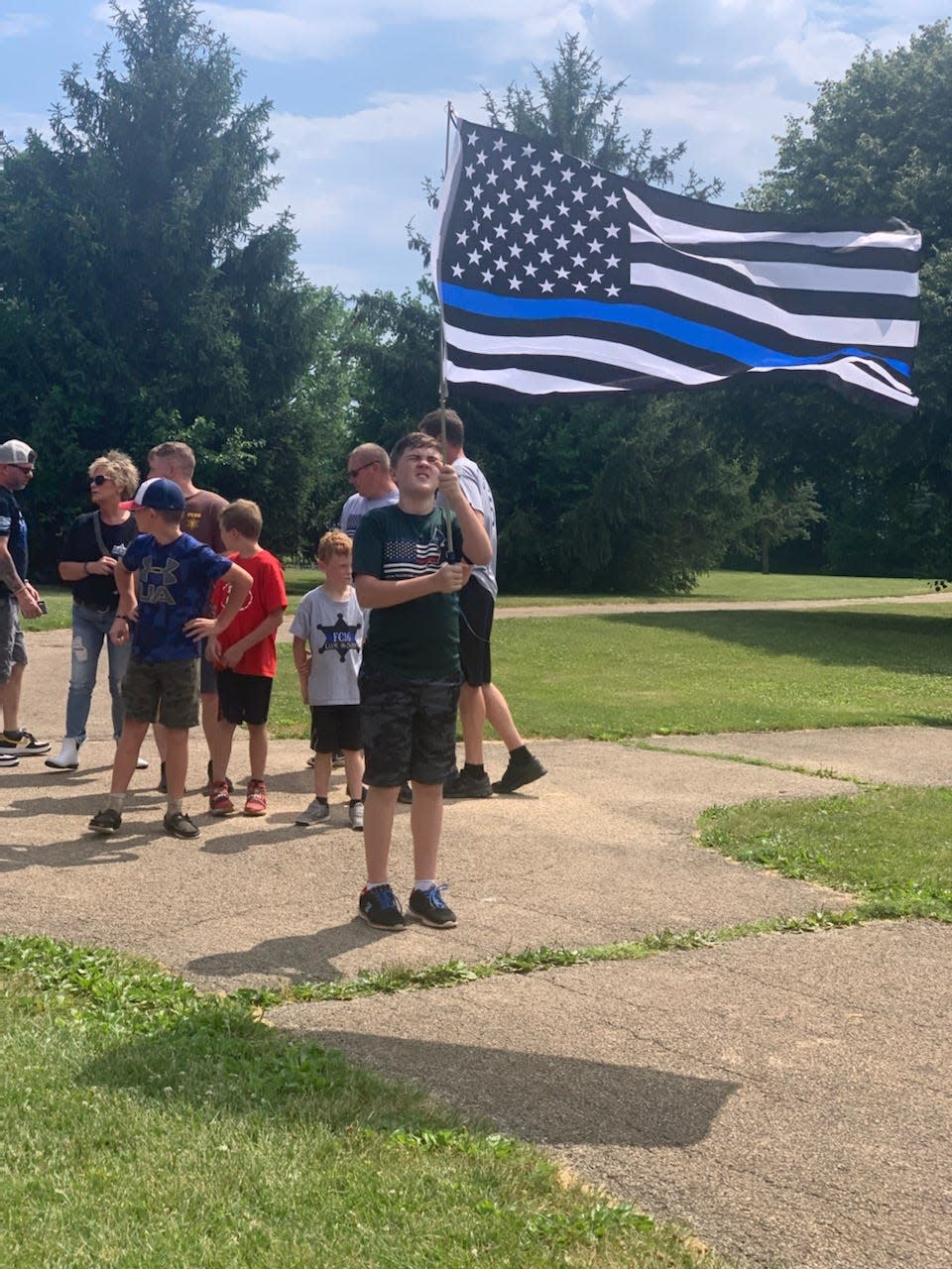 Zechariah Cartledge from Running 4 Heroes, Inc., was at Lakeland Park to run in memory of Deputy Troy Chisum.