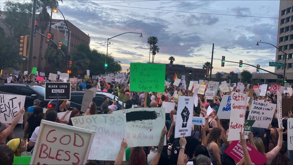 Protestors gather in the intersection of Congress Streets and Granada Avenue in Tucson, Arizona, after Roe V. Wade was overturned by the Supreme Court on June 24, 2022.