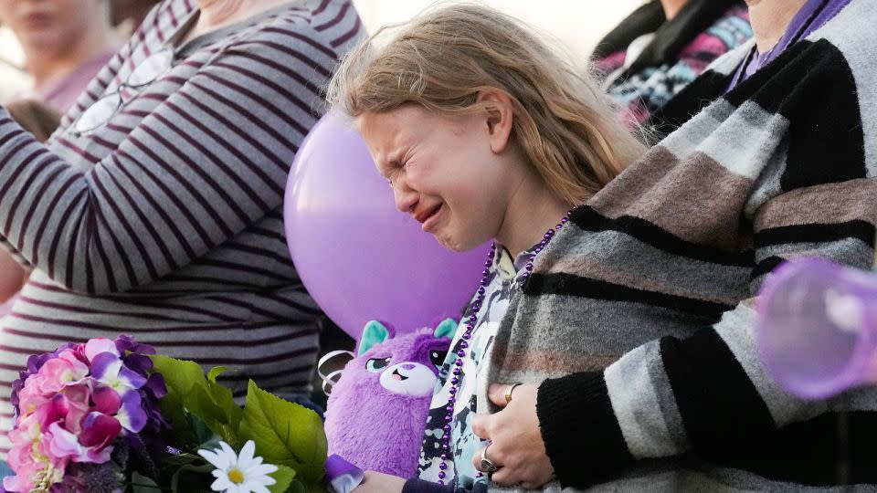 Kristlyn Wood, a cousin of 11-year-old Audrii Cunningham, reacts during a vigil in Cunningham's honor, on February 21 in Livingston, Texas. - Jason Fochtman/Houston Chronicle/AP