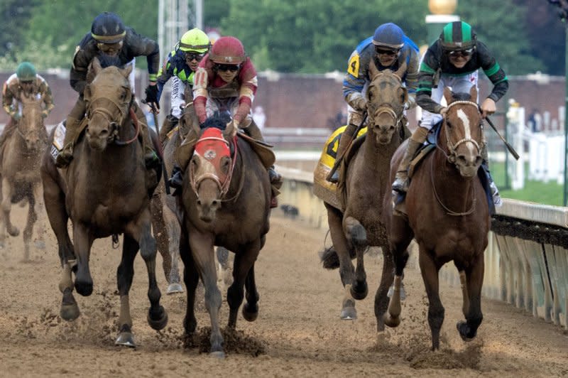 Mystik Dan (R), ridden by Brian Hernandez, Jr,, wins the 150th Kentucky Derby at Churchill Downs in Louisville, Ky., on Saturday. Sierra Leone (L) came in second and Forever Young (C) was third. Photo by Pat Benic/UPI