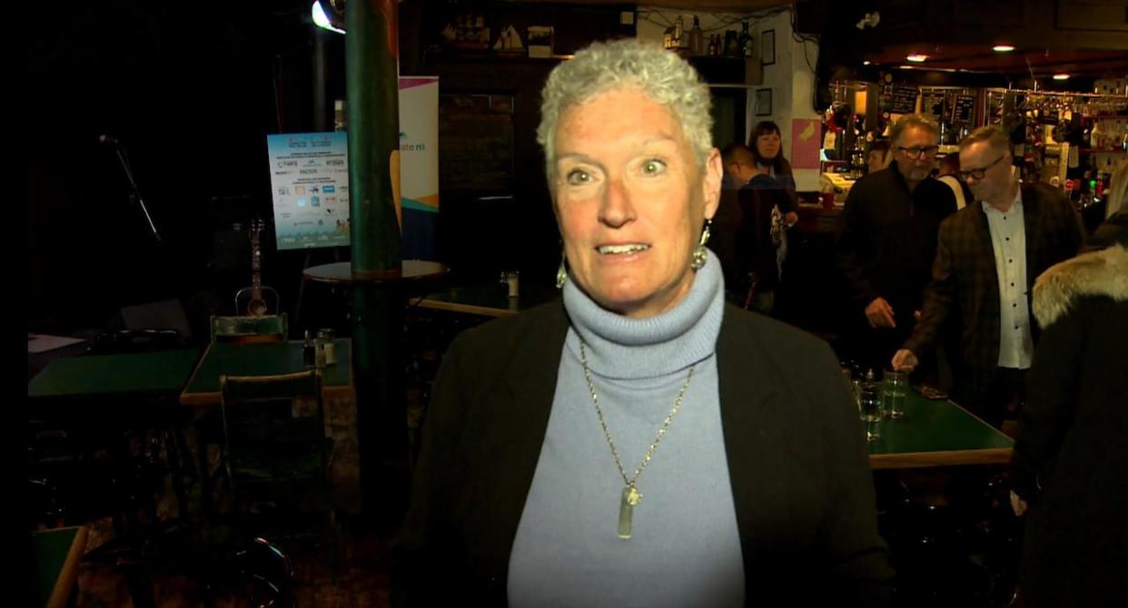 Julie Vogt, the Executive Director of the Newfoundland and Labrador Folk Arts Society, says the plan to allow alcohol consumption in most areas of the festival is to help generate more revenue to cover the rising costs of maintaining the yearly festival. (Curtis Hicks/CBC - image credit)