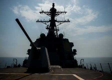 The U.S. Navy Arleigh Burke-class guided-missile destroyer USS Bainbridge steams through the Arabian Gulf