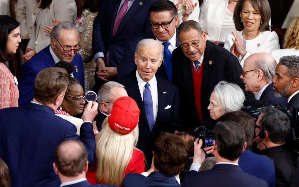 Joe Biden arrives to deliver the State of the Union address to a joint session of Congress in the House Chamber of the US Capitol