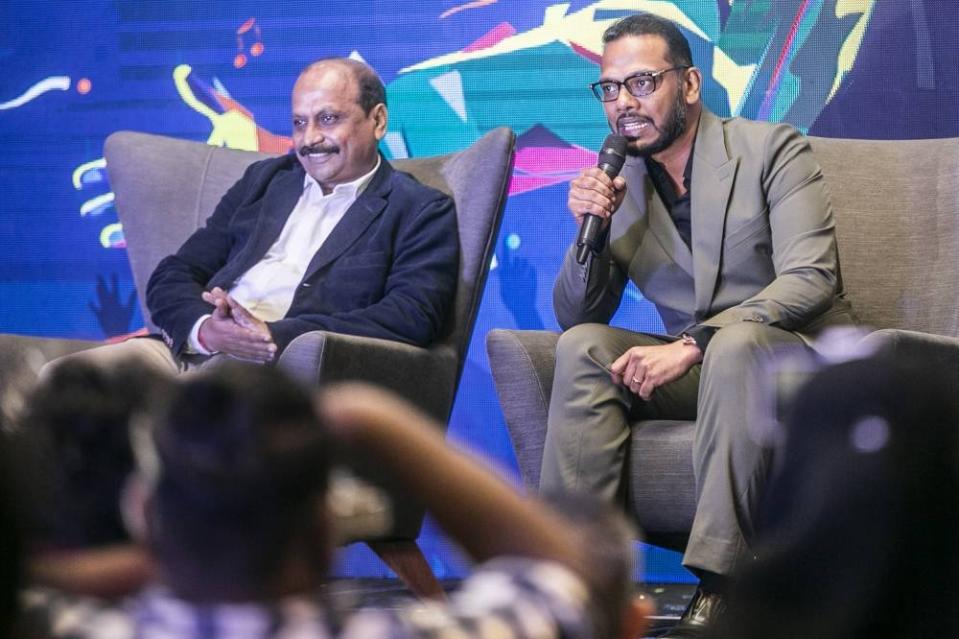 Senthil (left) and Mohamed (right) taking questions from members of the press and fan clubs at Le Meridien KL during the special announcement for AR Rahman's mega concert. — Picture by Hari Anggara.