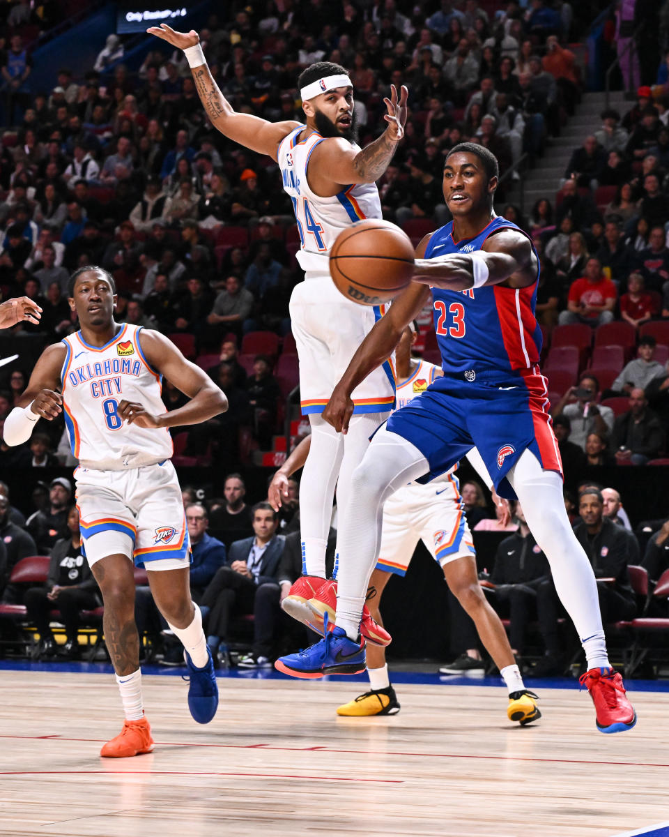 MONTREAL, CANADA – OCTOBER 12: Jaden Ivey #23 of the Detroit Pistons plays the ball past Kenrich Williams #34 of the Oklahoma City Thunder during the first half of a preseason NBA game at Bell Centre on October 12, 2023 in Montreal, Quebec, Canada. (Photo by Minas Panagiotakis/Getty Images)