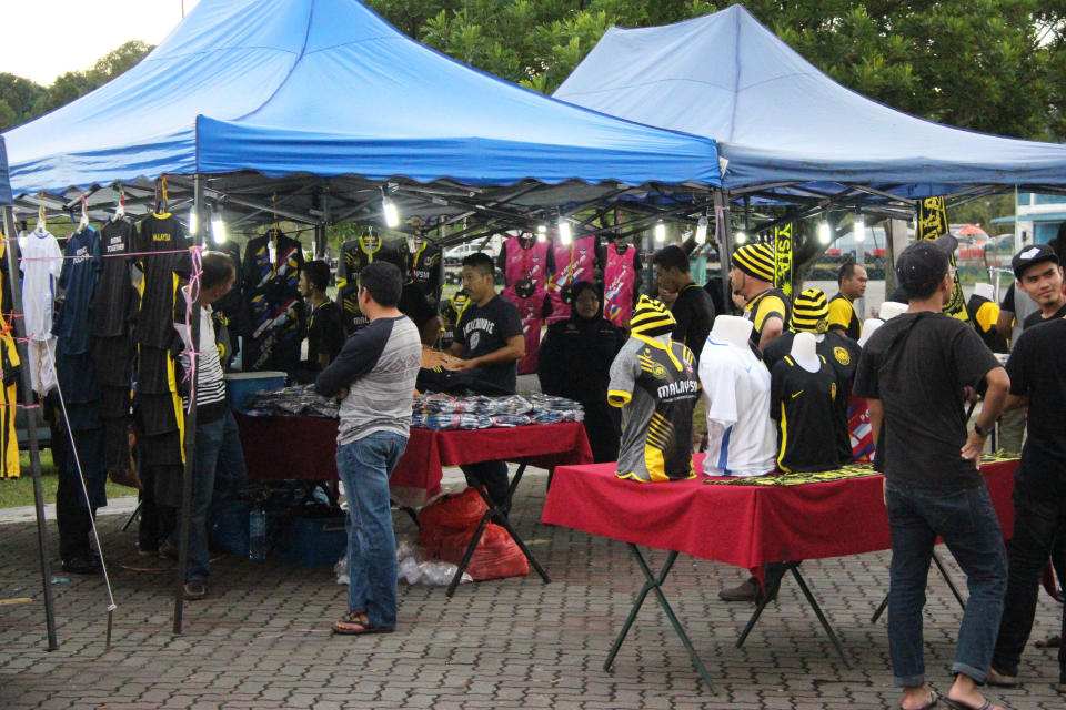 Retailers selling sports-related merchandise outside the Shah Alam Stadium, one of the venues for the SEA Games 2017. (PHOTO: Nigel Chin / Yahoo News Singapore)