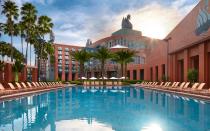 <p>With its elegant Mandara Spa, complimentary parking at Disney parks, and multitude of on-site dining options, this <a rel="nofollow noopener" href="http://www.swandolphin.com/" target="_blank" data-ylk="slk:luxurious set of hotels;elm:context_link;itc:0;sec:content-canvas" class="link ">luxurious set of hotels</a> hosts a seemingly endless list of perks. Guests can partake in on-site meals of every kind, including daily character dining at Garden Grove, upscale dinners at Shula’s Steak House and Il Mulino, and inventive mixology concoctions by way of Todd English’s excellent bluezoo. (The hotels even brew their own locally-crafted beer, Phins & Feathers.)</p> <p>Amenities between the two Starwood-affiliated towers are interchangeable, providing shared access to five lap and grotto pools, a beach, watercraft rentals, sand volleyball courts and an ever-changing daily calendar of family-friendly activities. The duo are not Disney-operated, but come with a selection of exclusive advantages, like Disney’s own park-to-park transportation by bus and boat, as well as advanced FastPass reservations and Extra Magic Hours (with admission), but by far the best benefit comes by way of its prime location. Both hotels offer easy access to dining and entertainment at Disney’s Boardwalk and are walking distance to both Epcot and Disney’s Hollywood Studios, which can be a time-saver. They’re ever-improving as well; Swan’s newly renovated rooms are luxe, containing thoughtful additions like handy USB outlets and double sinks, while the Dolphin is preparing to undergo a nearly $12 million lobby renovation in 2017.</p>