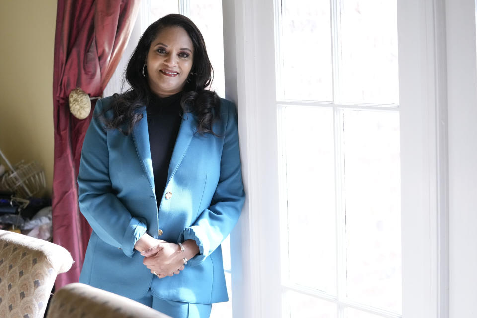 Ashley K. Shelton, executive director of Power Coalition for Equity & Justice in Louisiana, a voter advocacy organization that is trying to get left-leaning voters engaged for next year's elections, possess for a photo at her family home in Baton Rouge, La., Tuesday, Dec. 26, 2023. (AP Photo/Gerald Herbert)