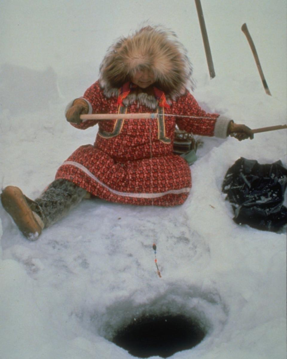 Traditional ice fishing in one of the subsistence practices at Kobuk Valley National Park.