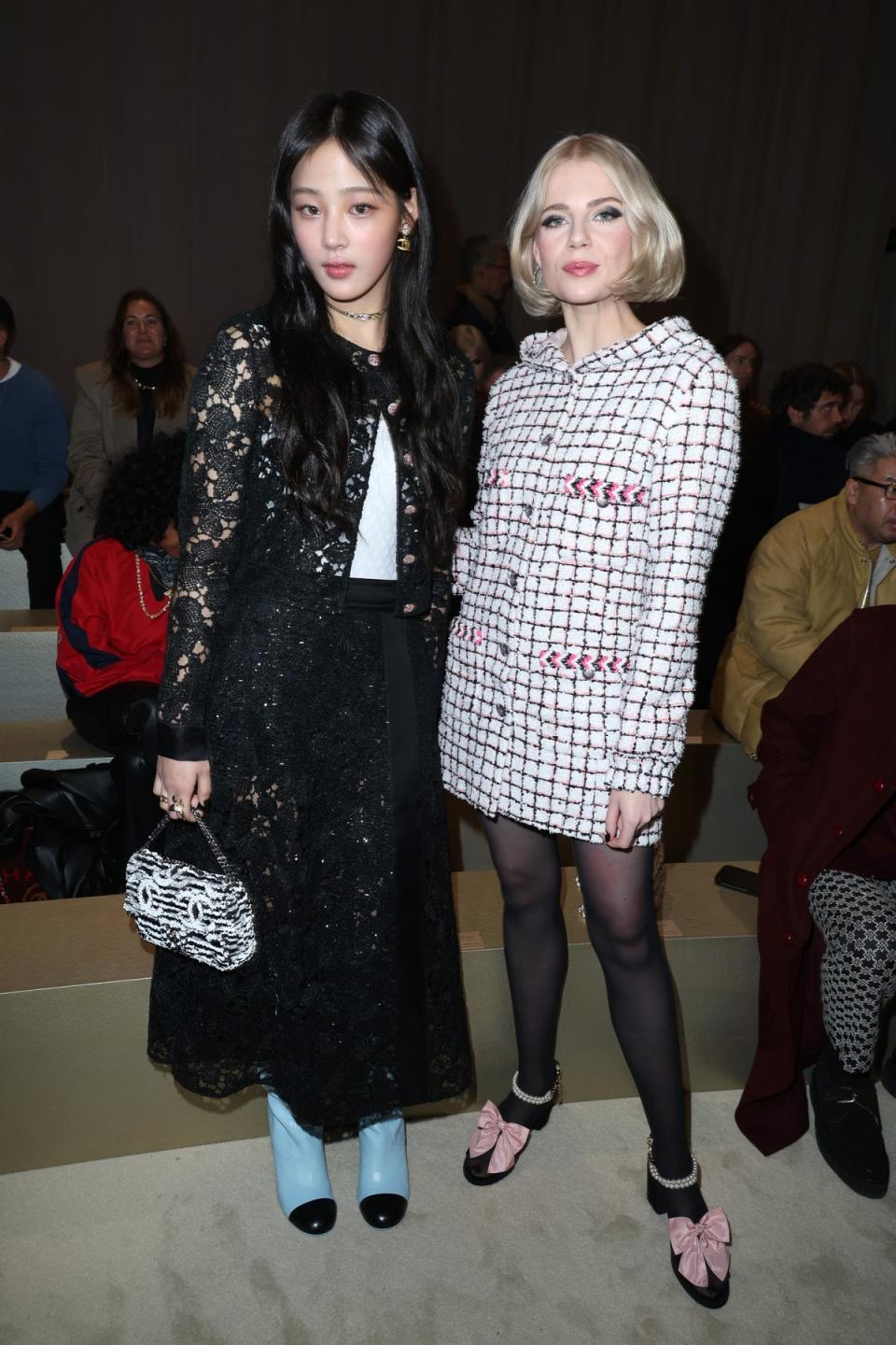 Min Ji and Lucy Boynton attend the Chanel Haute Couture show (Getty Images)