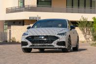 <p>The 2021 Hyundai Sonata N-Line is the performance version of the new redesigned Sonata, which will go on sale in fall 2020 with a sizeable bump in power and more aggressive styling and chassis tuning. Read the full story <a href="https://www.caranddriver.com/reviews/a30167582/2021-hyundai-sonata-n-line-prototype-drive/" rel="nofollow noopener" target="_blank" data-ylk="slk:here;elm:context_link;itc:0;sec:content-canvas" class="link ">here</a>.</p>