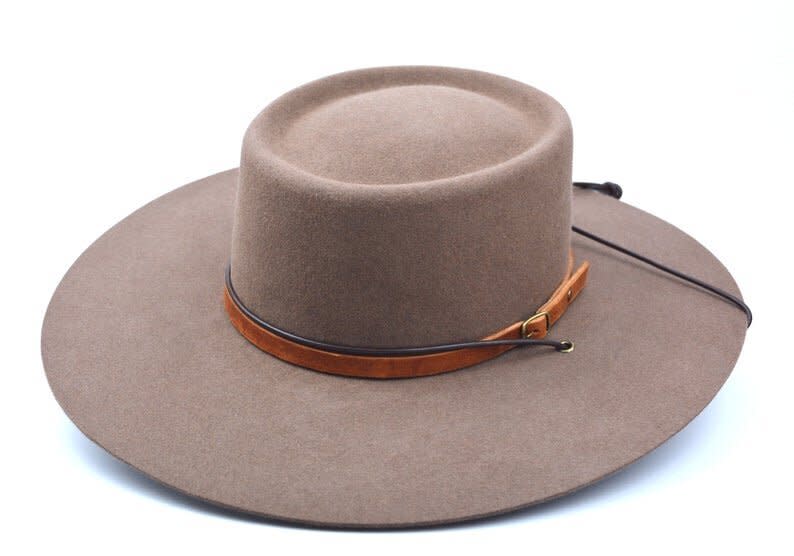 <strong><a href="https://fave.co/2KkEHJ7" target="_blank" rel="noopener noreferrer">Agnoulita Hats</a></strong> offers felt fedoras, bolero hats and wide brim hats.