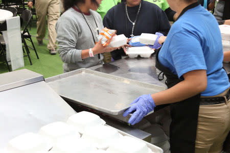 Food being served at a tent city set up to hold immigrant children separated from their parents or who crossed the U.S. border on their own, is seen in Tornillo, Texas, U.S., in this U.S. Department of Health and Human Services (HHS) image released on October 12, 2018. Courtesy HHS/Handout via REUTERS