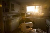 Sister Rachel Denton uses her sewing machine at St Cuthbert's Hermitage in Lincolnshire, north east Britain September 25, 2015. REUTERS/Neil Hall