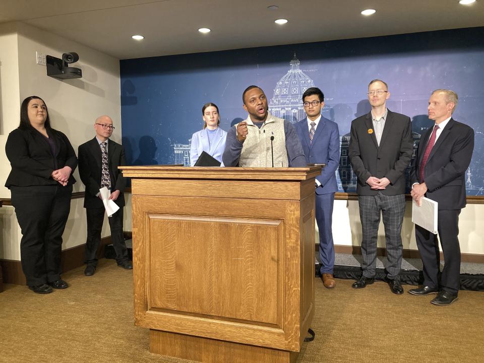 Elizer Darris, co-executive director of the Minnesota Freedom Fund, a nonprofit that helps people post bail, speaks at a news conference at the state Capitol in St. Paul, Minn., on Monday, Jan. 9, 2023, to call on the Legislature to restore voting rights for felons after they get out of prison. (AP Photo/Steve Karnowski)