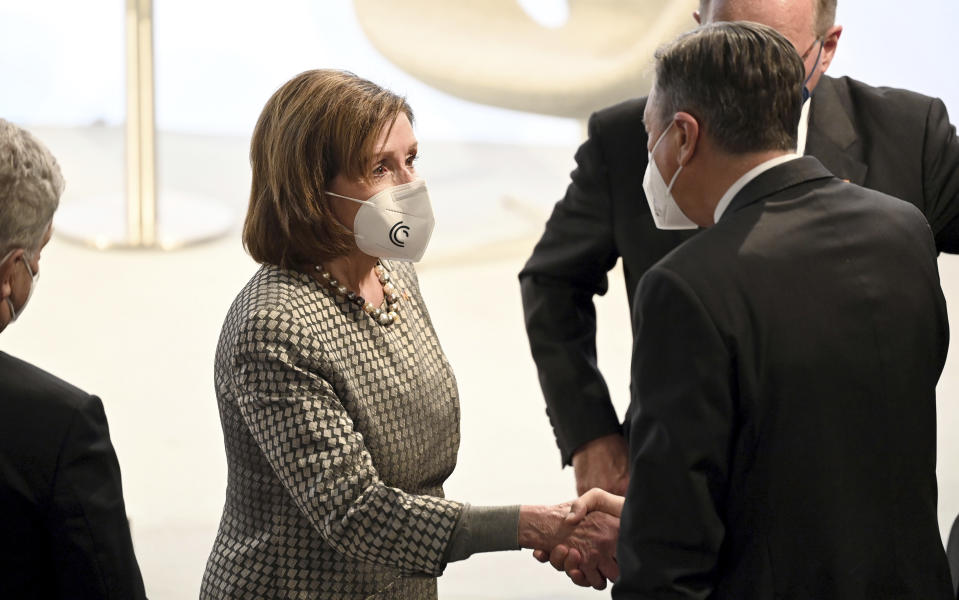 Nancy Pelosi, Speaker of the U.S. House of Representatives, arrives at the start of the Munich Security Conference in Munich, Germany, Friday, Feb. 18, 2022. (Sven Hoppe/dpa via AP)