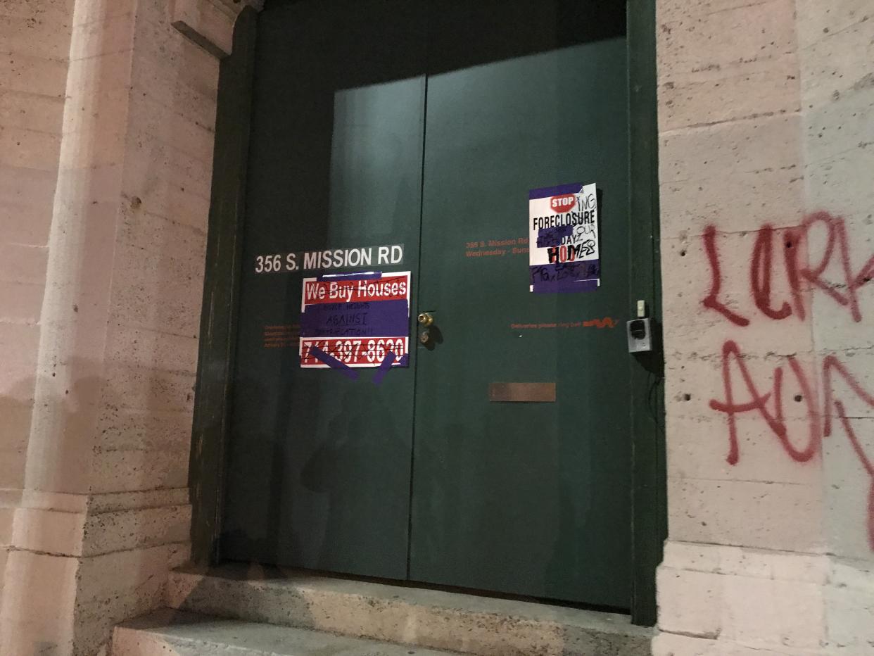 The door of the 356 Mission gallery was tagged by antri-gentrification activists in Boyle Heights. (Photo: Andrew Romano/Yahoo News)