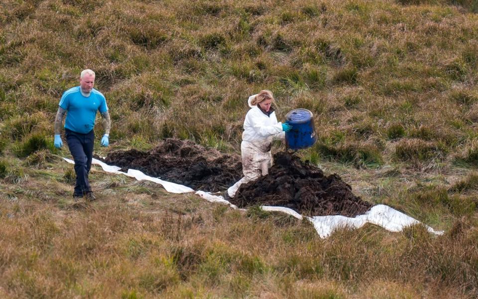 Police say soil samples have been taken for analysis from the site on Saddleworth Moor - PA