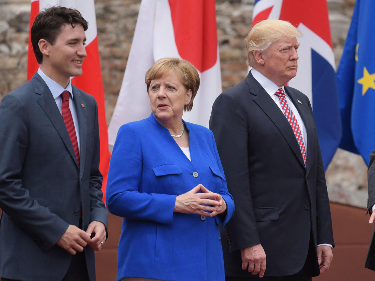 Canada's Prime Minister Justin Trudeau, Germany's Chancellor Angela Merkel and Donald Trump during the G7 Summit in Taormina: AFP/Getty