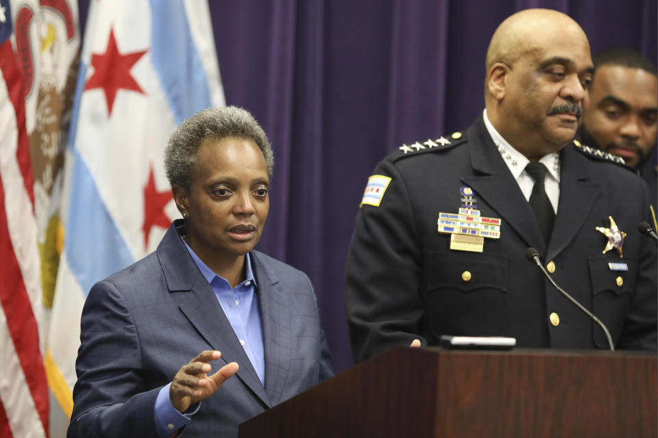 FILE - In this Nov. 7, 2019 file photo, Mayor Lori Lightfoot speaks as Chicago Police Superintendent Eddie Johnson announces his retirement after more than three years leading the department in Chicago. Mayor Lightfoot fired Police Supt. Eddie Johnson Monday Dec. 2, 2019, due to his "ethical lapses."(AP Photo/Teresa Crawford File)