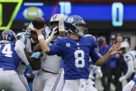 New York Giants quarterback Daniel Jones (8) throws a pass during the first half of an NFL football game against the Carolina Panthers, Sunday, Oct. 24, 2021, in East Rutherford, N.J. (AP Photo/Bill Kostroun)