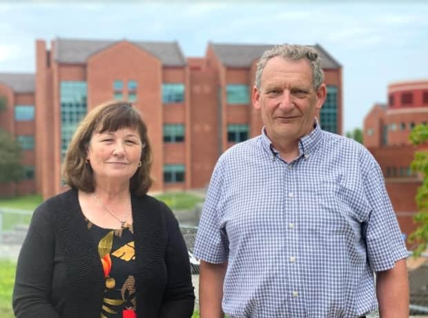 Heather and Malcolm Lister, the parents of Tom Lister, a resident patient at Grand River Hospital's Freeport Campus, say the hospital's internet policy has left them having to pay for the streaming services the 30-year-old needs to thrive. (Hala Ghonaim/CBC News - image credit)