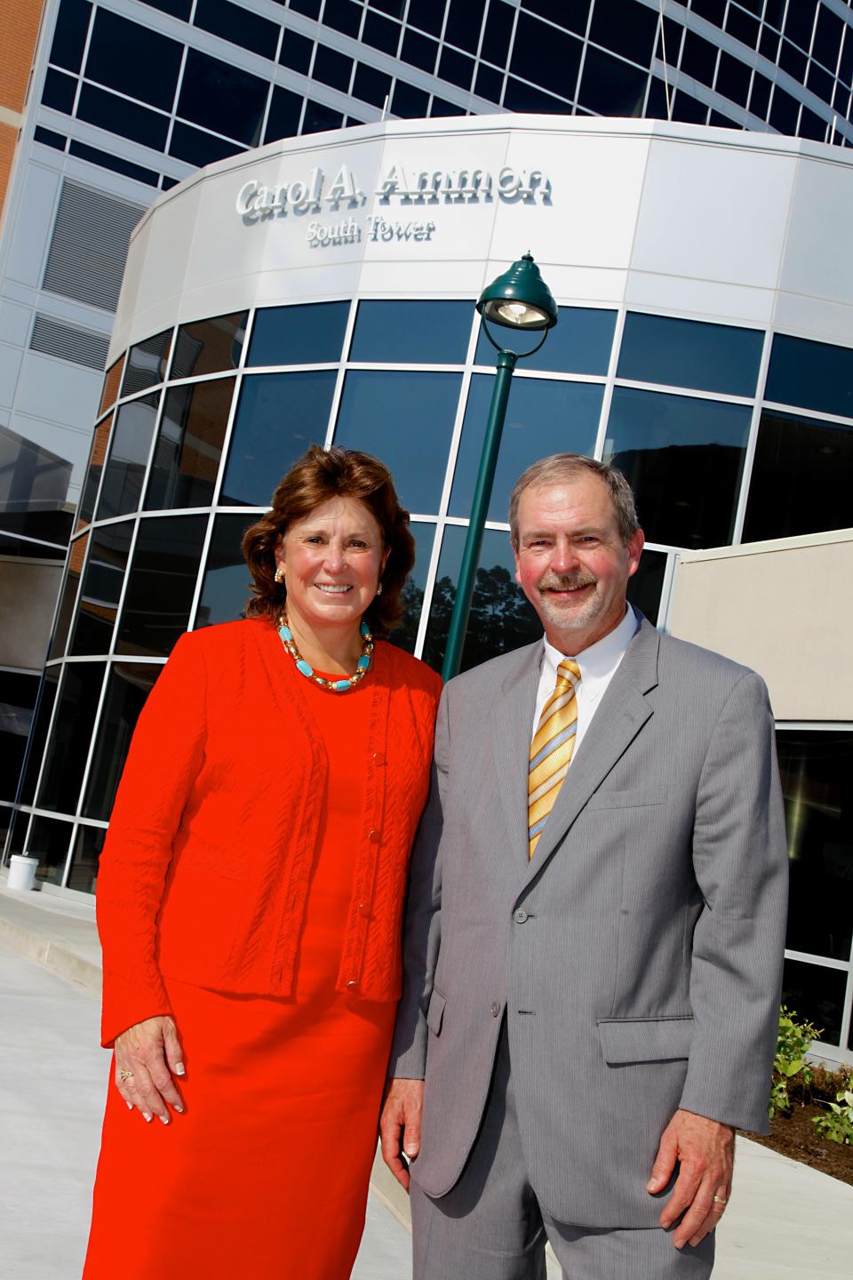 Carol Ammon and former ChristianaCare president and CEO Dr. Robert J. Laskowski stood outside Wilmington Hospital's Carol A. Ammon South Tower at the tower's 2013 dedication ceremony.