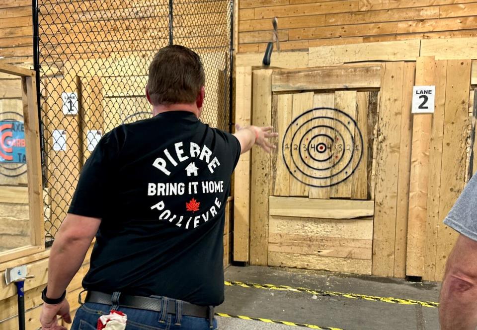 Brian Green of Windsor hurls an axe at Bad Axe Throwing on Dougall Avenue.