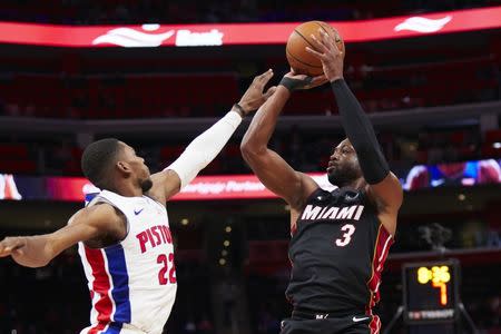 Nov 5, 2018; Detroit, MI, USA; Miami Heat guard Dwyane Wade (3) shoots over Detroit Pistons guard Glenn Robinson III (22) in the first half at Little Caesars Arena. Mandatory Credit: Rick Osentoski-USA TODAY Sports