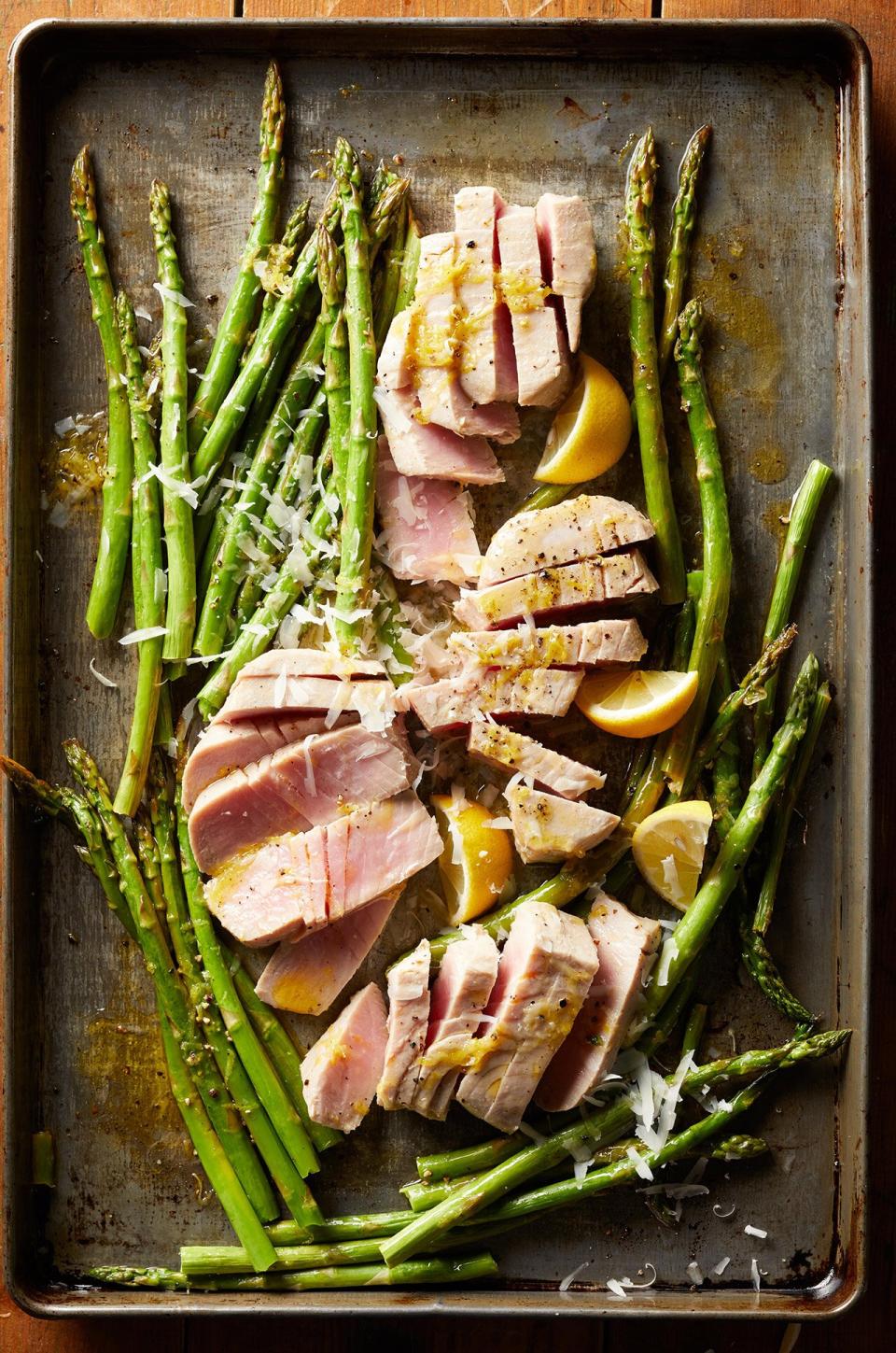 One sheet pan equals one delicious dinner. Roast tuna and asparagus together on the same pan with lemon juice and zest to make this mouthwatering meal.