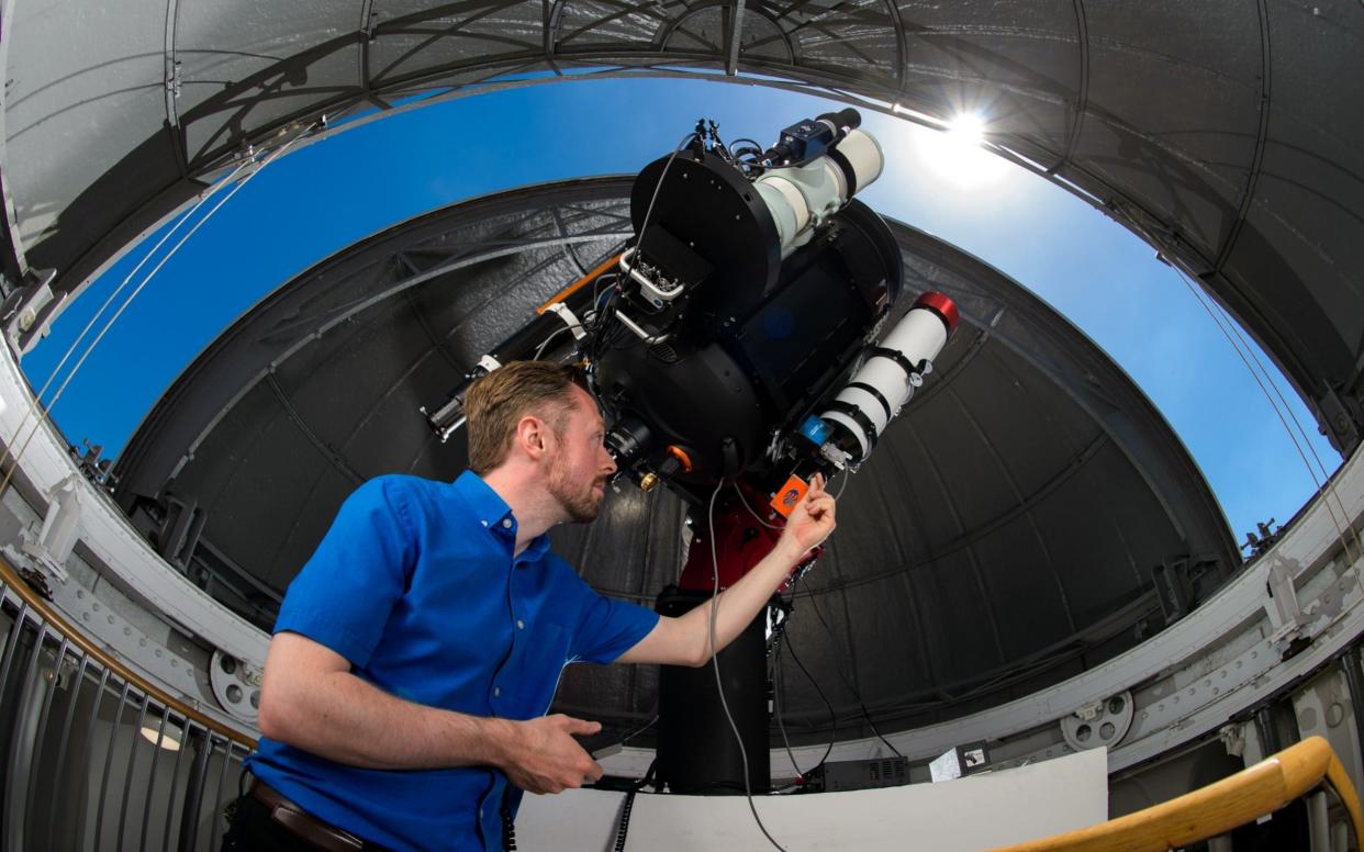 Brendan Owens with the AMAT telescope at the Royal Observatory at Greenwich - Anthony Upton