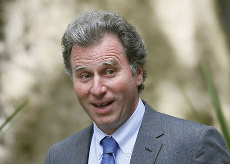 Oliver Letwin arrives at 10 Downing Street as Britain's re-elected Prime Minister David Cameron names his new cabinet, in central London, Britain in this May 11, 2015 file photo. REUTERS/Stefan Wermuth/Files