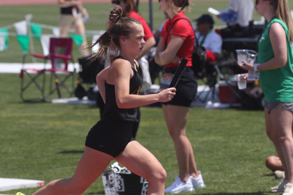 Colonel Crawford's Gabby Roston helped the 4x400 qualify for finals.