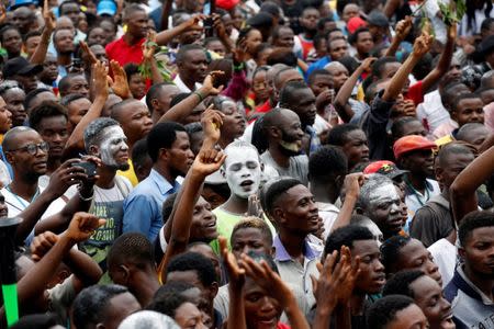 Supporters of Felix Tshisekedi, leader of the Congolese main opposition party, the Union for Democracy and Social Progress (UDPS) who was announced as the winner of the presidential elections, celebrate outside the party's headquarters in Kinshasa, Democratic Republic of Congo, January 10, 2019. REUTERS/Baz Ratner